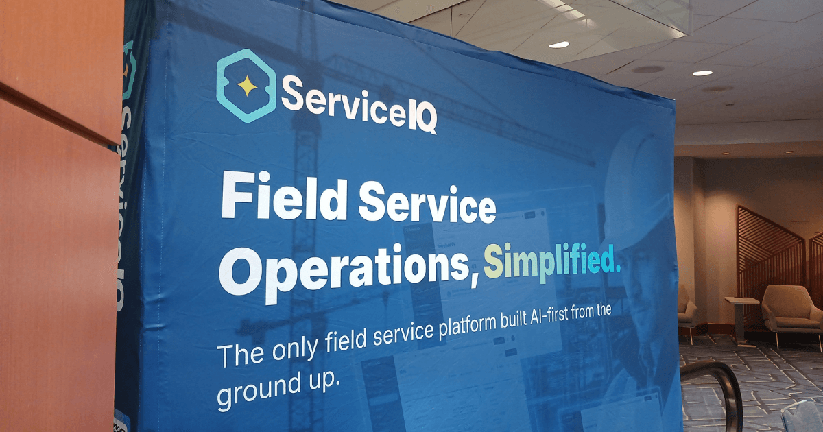 ServiceIQ booth banner reading 'Field Service Operations, Simplified' at the AGC Technology Conference 2026